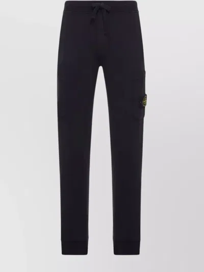 STONE ISLAND SHEARLING AND SUEDE CARGO TROUSERS