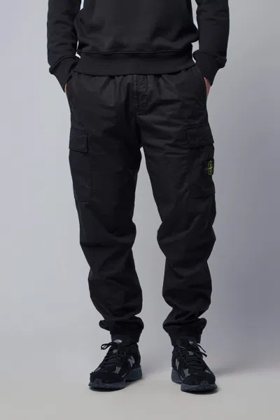 Stone Island Loose-fit Joggers With Pockets And Elasticateed Cuffs In Black