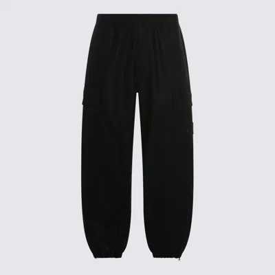 STONE ISLAND TROUSERS BLACKS AND GREYS