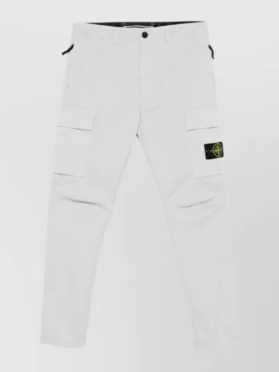 STONE ISLAND TROUSERS FEATURING VARIOUS POCKETS