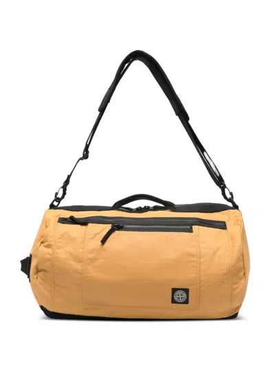 Stone Island Zip-fastening Front-pocket Duffle Bag In Brown