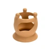 Storied Home Creative Co-op Handmade Terracotta Candle Holder With Circle Of Figures In Brown