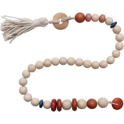 Storied Home Wood Bead Garland With Cotton Tassel In Neutral