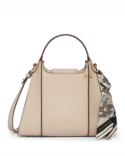 Strathberry Arkshell Medium Leather Handbag In Neutral