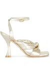 Stuart Weitzman High Heel Sandals With Metallic Knot Detail In Gold