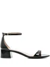 Stuart Weitzman Nudist Patent Ankle-strap Sandals In Black