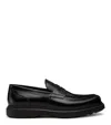 Stuart Weitzman Sculpted Rubber Sole Moccasin With Elastic Inserts In Black