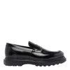 Stuart Weitzman Sculpted Rubber Sole Moccasin With Elastic Inserts In Black