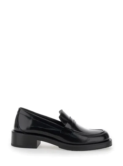 STUART WEITZMAN BLACK SLIP-ON LOAFERS