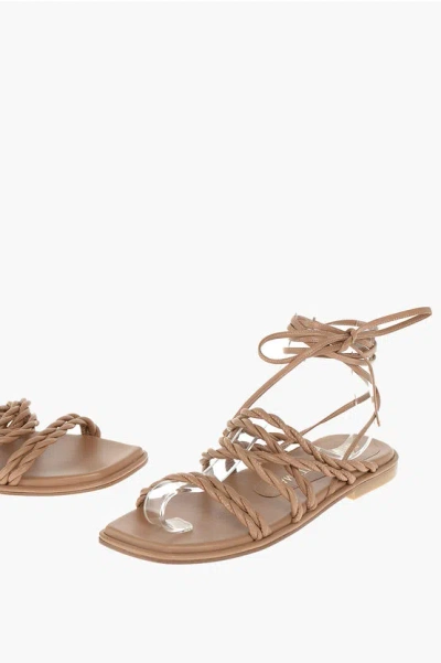 Stuart Weitzman Braided Soft Leather Lace Up Calypso Sandals In Brown