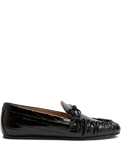 Stuart Weitzman Britt Bow Crocodile-effect Patent Leather Loafers In Black