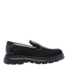 Stuart Weitzman Sculpted Rubber Sole Moccasin With Elastic Inserts In Black
