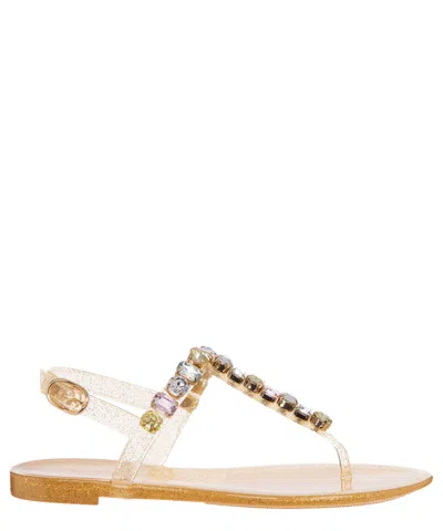 Stuart Weitzman Jaide Jelly Sandals In Gold