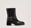 Stuart Weitzman Jax Harness Leather Moto Booties In Black