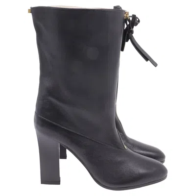 Stuart Weitzman Jett Front-zipped Mid-calf Boots In Black Leather