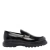 Stuart Weitzman Sculpted Rubber Sole Moccasin With Elastic Inserts In Black