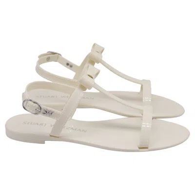 Stuart Weitzman Mellie Bow Jelly Flat Sandals In White Rubber