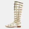 Stuart Weitzman Metallic Gold Leather And Elastic Gladiator Flat Sandals In Neutral