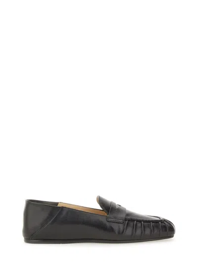 Stuart Weitzman Moccasin Brooks In Black