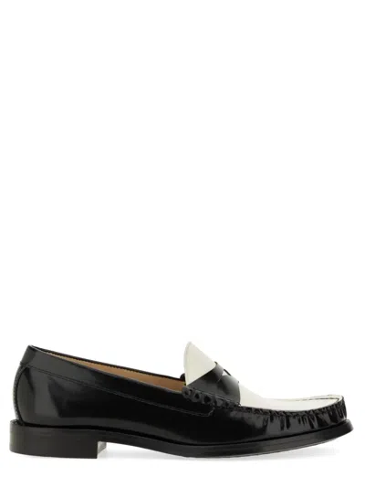 Stuart Weitzman Moccasin Lottie In Black