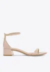 Stuart Weitzman Patent Leather Sandals With Adjustable Ankle Strap In Beige