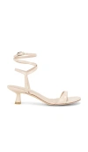 Stuart Weitzman Nudist Patent Leather Ankle-wrap Sandals In Neutral