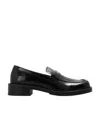 Stuart Weitzman Palmer Slip-on Loafers In Black
