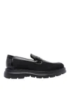 Stuart Weitzman Sculpted Rubber Sole Moccasin With Elastic Inserts In Black