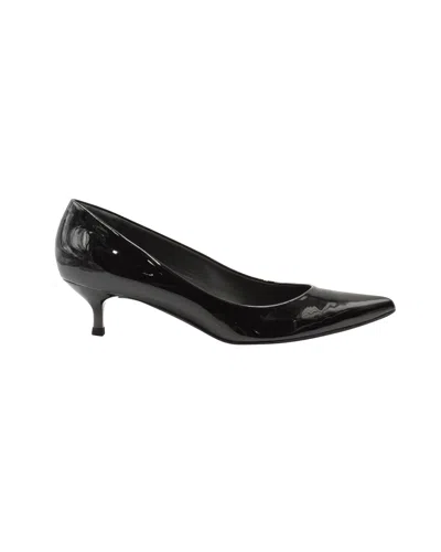 STUART WEITZMAN POINTED TOE PUMPS IN BLACK PATENT LEATHER