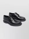 Stuart Weitzman Round Toe Lace-up Leather Brogues In Black