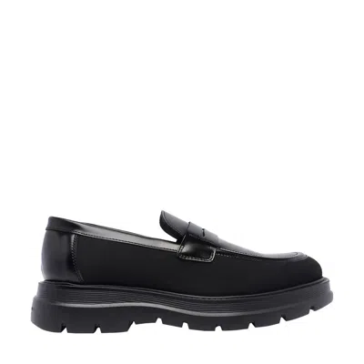 STUART WEITZMAN SCULPTED RUBBER SOLE MOCCASIN WITH ELASTIC INSERTS