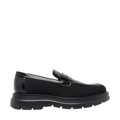 Stuart Weitzman Sculpted Rubber Sole Moccasin With Elastic Inserts In Black