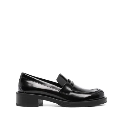 Stuart Weitzman Palmer Glossed-leather Loafers In Black