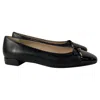Stuart Weitzman Sleek Cap Toe Bow Flats In Black Leather In Black