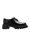 Stuart Weitzman Strap-up Dress Shoes In Black