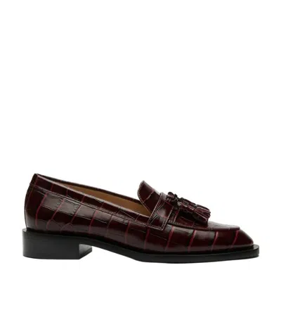 Stuart Weitzman Tassel-detail Crocodile Loafers In Black