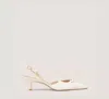 Stuart Weitzman Tully Bow-detailed Leather Point-toe Slingback Pumps In Seashell