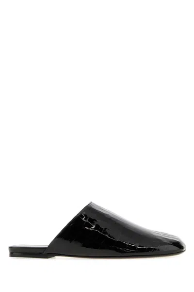 Stuart Weitzman Flat Slip-on Slides In Black