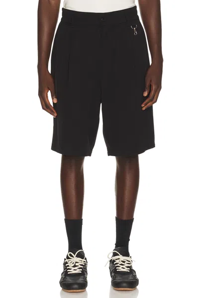 Students Golf Calculus Baggy Pleated Shorts In Black