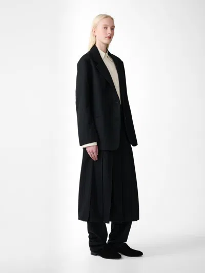 Studio Nicholson Asymmetric Pleated Kilt Mini Skirt In 100% Wool In Black