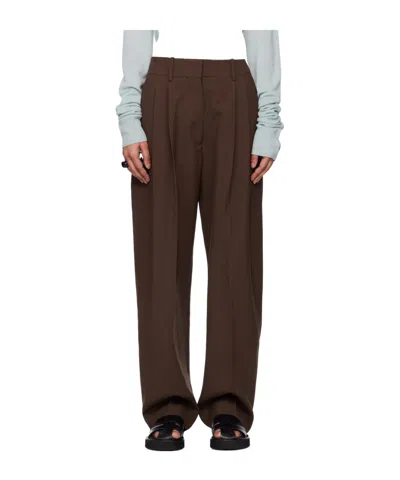 Studio Nicholson Belt-lined Casual Pants In Brown
