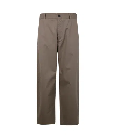 STUDIO NICHOLSON STUDIO NICHOLSON SLIM-FIT CURVED LEG TROUSERS