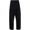 Studio Nicholson Tuck Wool Trousers