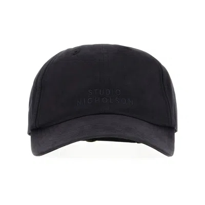 Studio Nicholson Caps In Black