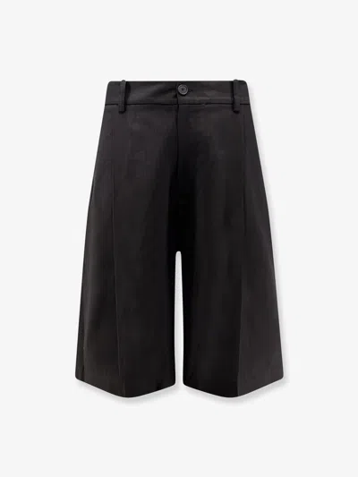 Studio Nicholson Cotton And Linen Bermuda Shorts In Black