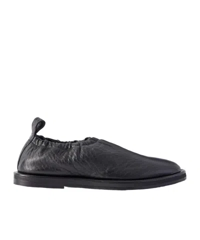 Studio Nicholson Crinkled Leather Loafers In Black