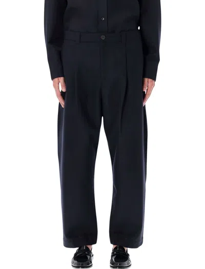 STUDIO NICHOLSON STUDIO NICHOLSON CROPPED WOOL NAVY TUCK TROUSERS