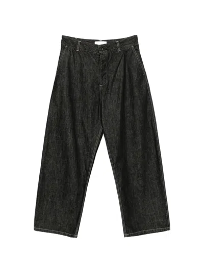 Studio Nicholson Curved Leg Jeans In Black