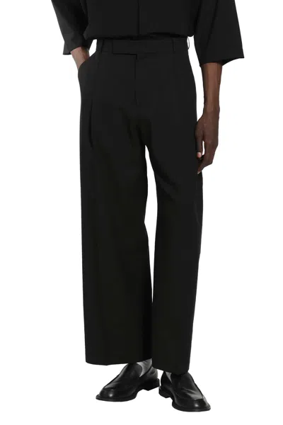 Studio Nicholson Peached Pleated Wide-leg Cotton-twill Trousers In Black