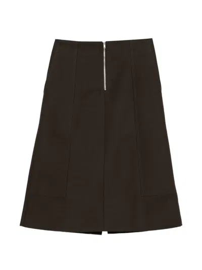 Studio Nicholson 다크 프런트 지퍼 A라인 미디 스커트 In Brown